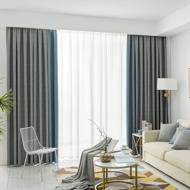 Grey blackout curtains in a modern Dubai apartment