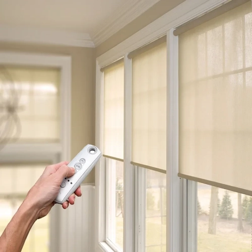 Modern motorized blinds in a cozy room, controlled wirelessly using a remote device.