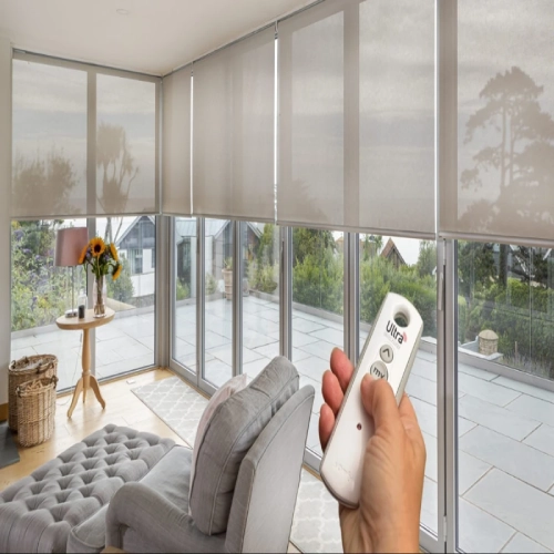 Motorized blinds with remote control, adjusting light and privacy in a modern living room