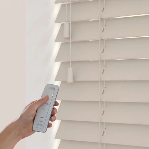 Stylish motorized blinds in a modern bathroom, providing privacy with ease.