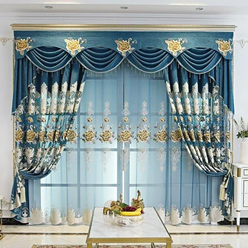 luxurious set of blue and gold embroidery drapes, featuring a detailed floral pattern on the valance and side panels.